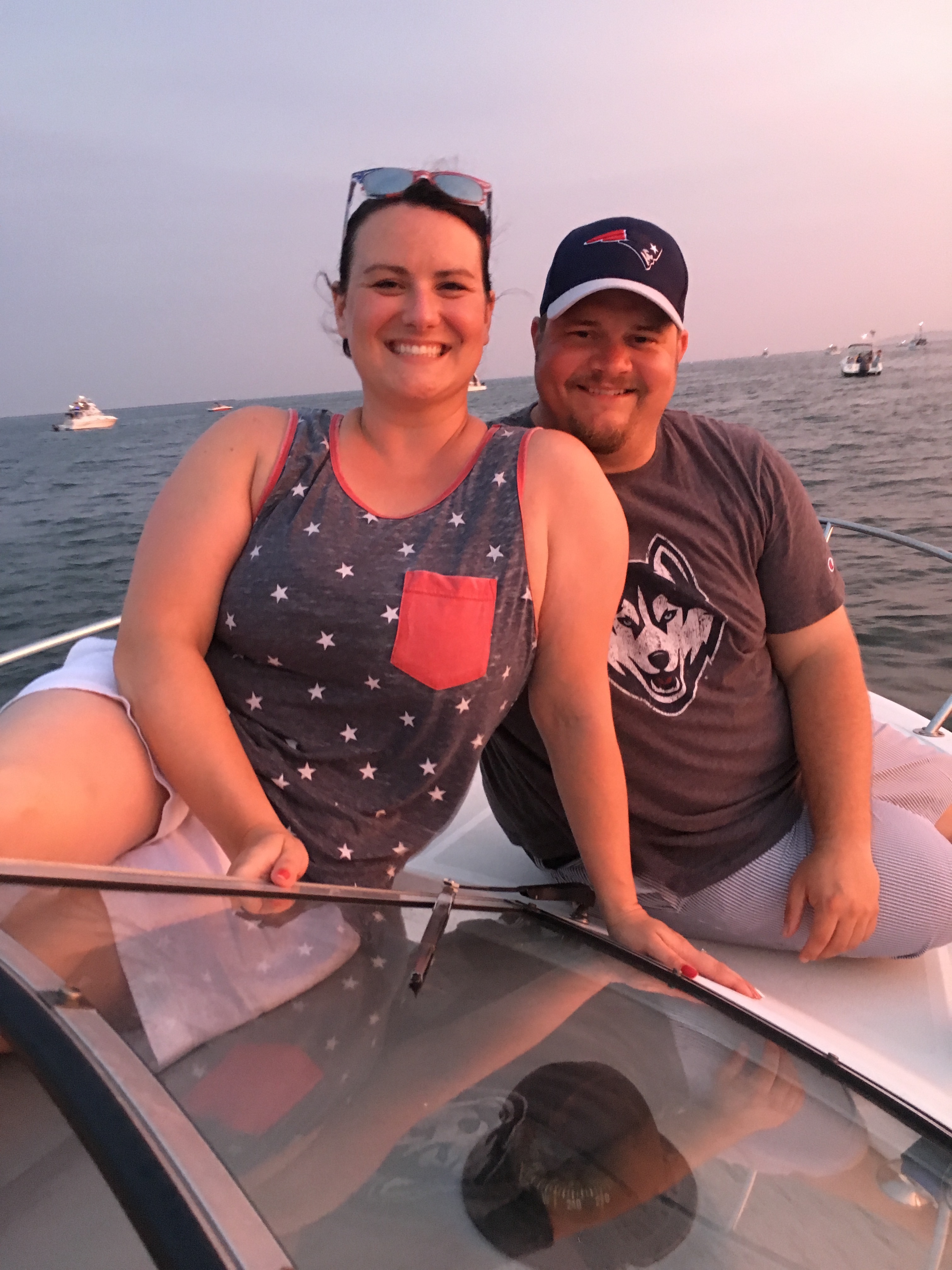 Dave and Rebe sitting on the bow of the Dancing Nanseas II